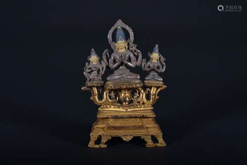 A GILT-BRONZE FIGURE OF AVALOKITESHVARA. MING PERIOD