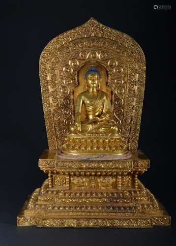 A LARGE GILT-BRONZE FIGURE OF SAKYAMUNI.MING PERIOD