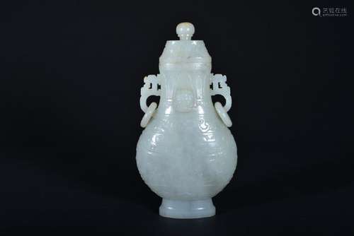 A WHITE JADE CARVING OF 'LIONHEAD' VASE AND COVER.QING