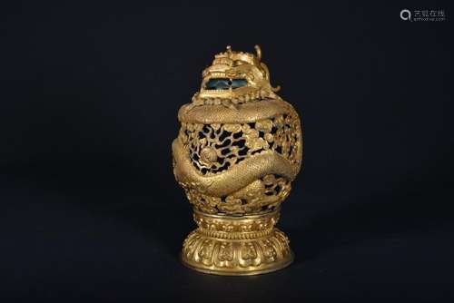 A GILT-BRONZE 'DRAGON' BURNER AND COVER .QING PERIOD