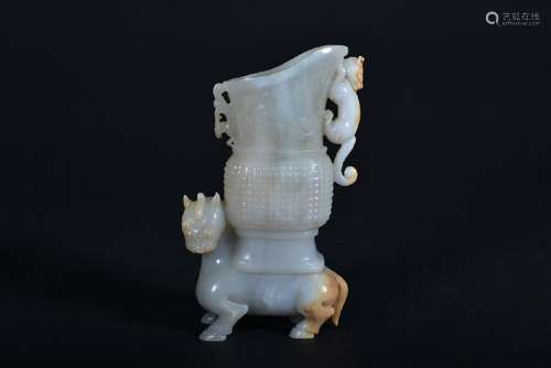 A CARVED WHITE JADE 'BEAST' VASE.MING PEROD