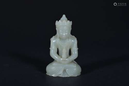 A WHITE JADE CARVING OF AMITAYUS.QING PERIOD