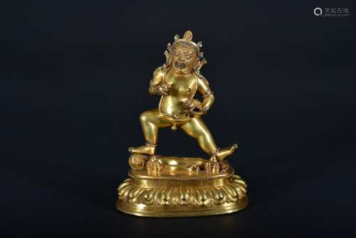 A GILT-BRONZE FIGURE OF KUBERA.QING PERIOD