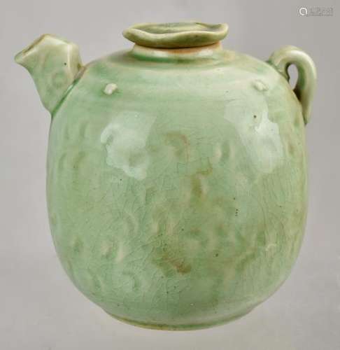 A Celadon Glazed Stoneware Wine Pot