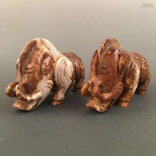 A Pair of Chinese Archaic 'Wild Boar' Jade