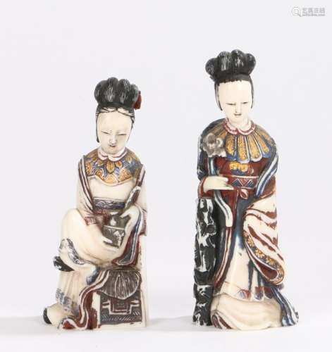 Two Japanese Meiji period ivory snuff bottles, both in the form of figures heightened in gold,