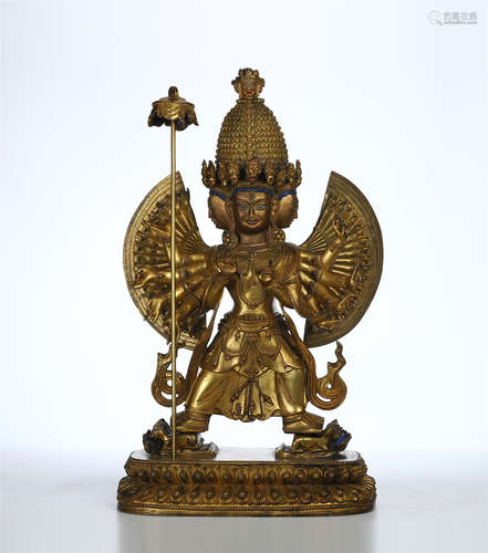 TIBETAN GILT BRONZE STANDING FOUR FACE EIGHT ARM BUDDHA