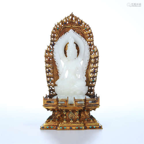 CHINESE WHITE JADE SEATED GUANYIN IN GILT BRONZE BASE