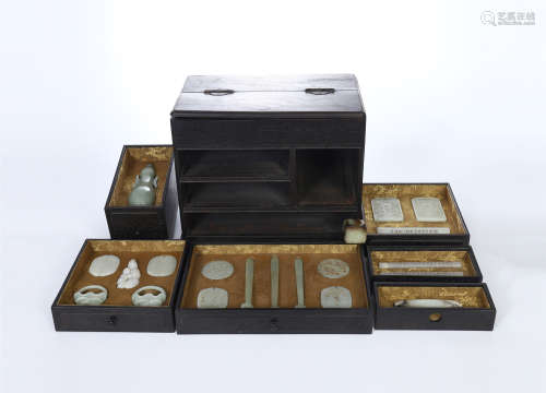 COLLECTION OF CHINESE WHITE JADE CARVINGS IN ROSEWOOD TREASURE CASE