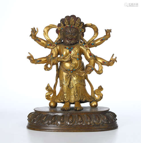 TIBETAN GILT BRONZE STANDING SIX ARM BUDDHIST GUARDIAN