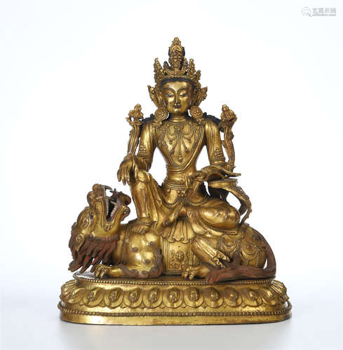 CHINESE GILT BRONZE SEATED GUANYIN ON BEAST