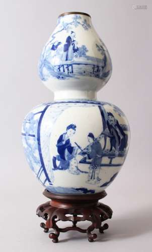 A GOOD 19TH CENTURY CHINESE BLUE & WHITE DOUBLE GOURD VASE & HARDWOOD STAND, the vases body