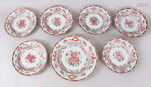 A SET OF SEVEN 18TH CENTURY CHINESE FAMILLE ROSE EXPORT PLATES, all decorated with scenes of