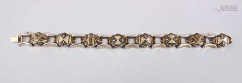 AN ISLAMIC WHITE METAL BRACELET with links containing inset metal plaques, the gold coloured clasp