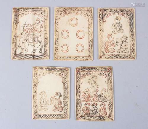 A SET OF FIVE RARE 18TH CENTURY INDIAN POLYCHROME IVORY PLAYING CARDS, 6.5cm x 4.5cm.