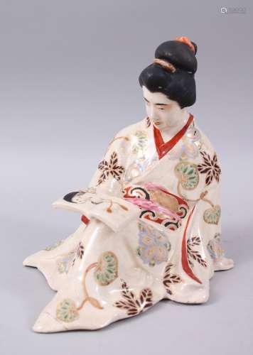 A JAPANESE LATE MEIJI PERIOD SATSUMA FIGURE OF A GEISHA, modeled in a seated reclined position