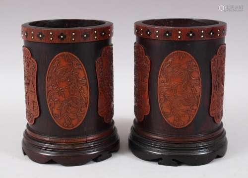 A LOVELY PAIR OF 19TH CENTURY CHINESE CANTON BAMBOO BRUSH POTS, each pot with four applied carved