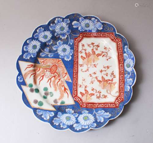 A JAPANESE MEIJI PERIOD IMARI DECORATED BLUE & WHITE PORCELAIN PLATE, with scalloped edge and