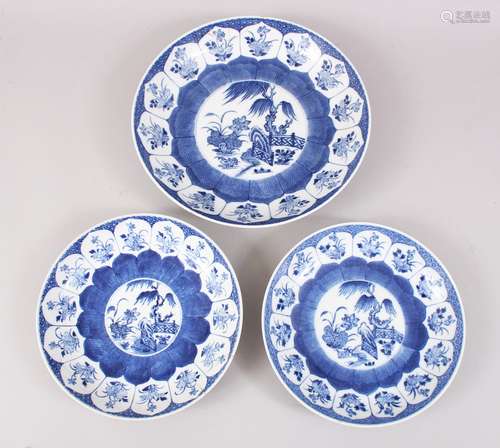 THREE 19TH CENTURY CHINESE BLUE & WHITE PORCELAIN PLATES, all three decorated in a similar way, with