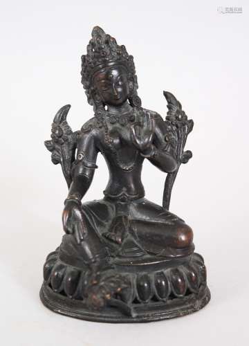 A 19TH / 20TH CENTURY NEPALESE BRONZE DEITY / BUDDHA, seated upon a lotus form base, in a meditation