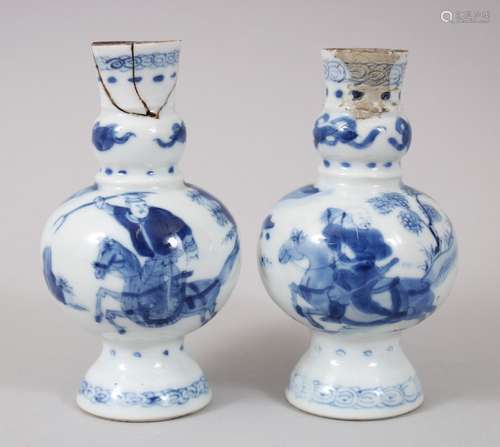 A SMALL PAIR OF CHINESE KANGXI BLUE AND WHITE PORCELAIN VASES, the body of the vases with decoration