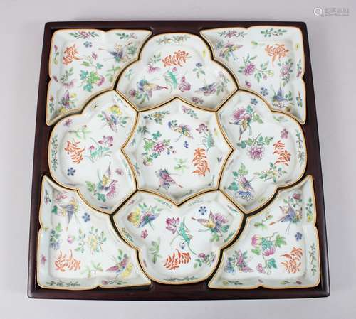 A GOOD CHINESE LATE 19TH CENTURY CANTON FAMILLE ROSE PORCELAIN SUPPER SET & STAND, the sections of