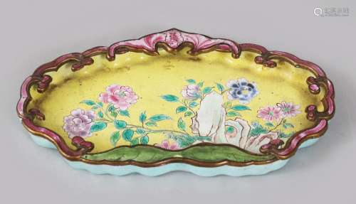 A 19TH CENTURY CHINESE ENAMEL DISH / TRAY, decorated with scenes of flowers amongst rocky