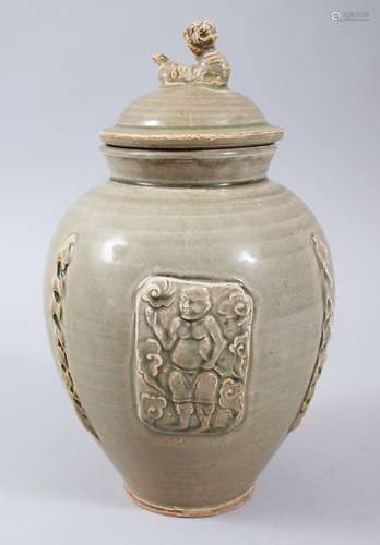 A CHINESE LONGQUAN CELADON CRACKLE GLAZE JAR & COVER, with moulded panels of immortals, the lid with