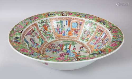 A LARGE 19TH CENTURY CHINESE CANTON FAMILLE ROSE PORCELAIN BOWL, decorated with various panels
