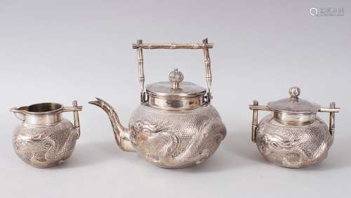 A GOOD LATE 19TH CENTURY CHINESE BAMBOO SOLID SILVER TEA SET BY WAN HING , each item with embossed
