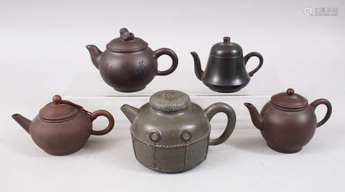 A MIXED LOT OF FIVE 19TH / 20TH CENTURY CHINESE YIXING CLAY TEA POTS, consisting of five clay Yixing