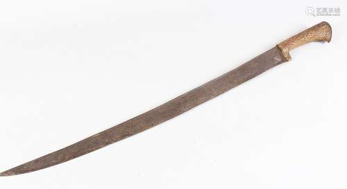 AN 18TH CENTURY INDIAN SWORD, with engraved blade and handle with repousse decoration, 77cm long.