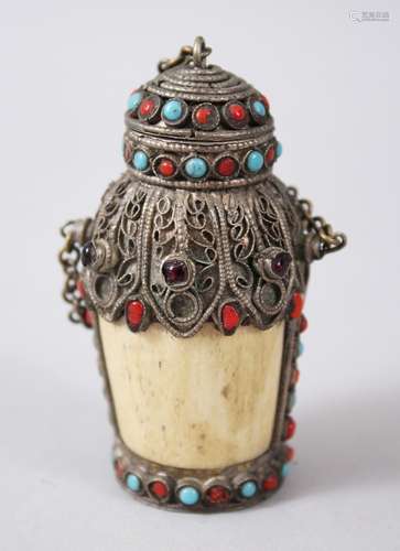 A 19TH CENTURY SINO - TIBETAN BONE INLAID SNUFF BOTTLE, the body of the snuff bottle formed bone