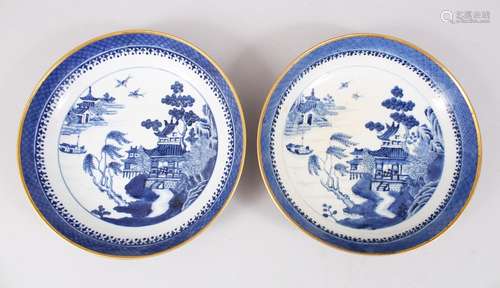 A PAIR OF 18TH CENTURY CHINESE QIANLONG BLUE & WHITE PORCELAIN SAUCER DISHES, both similarly