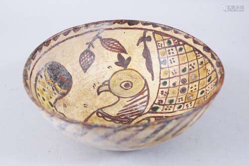 A RARE 10TH-12TH CENTURY PERSIAN CIRCULAR POTTERY BOWL, the centre painted with a bird and other