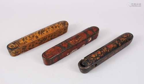 THREE GOOD 19TH CENTURY PERSIAN QAJAR PAPIER MACHE LACQUER PEN BOXES.