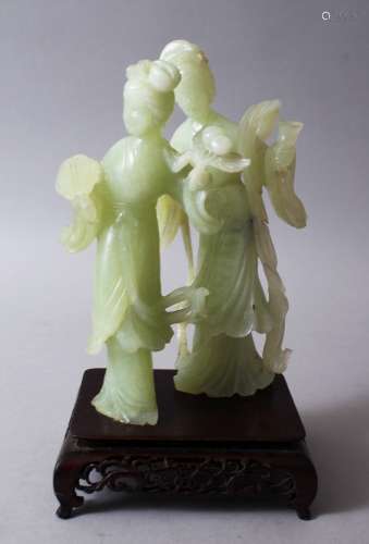 A LATE 19TH / EARLY 20TH CENTURY CHINESE CARVED JADEITE FIGURE OF TWO BEAUTYS, stood upon a carved