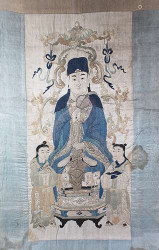 A GOOD 19TH CENTURY CHINESE FRAMED SILK EMBROIDERED PICTURE OF GUANYIN, she is shown seated upon a