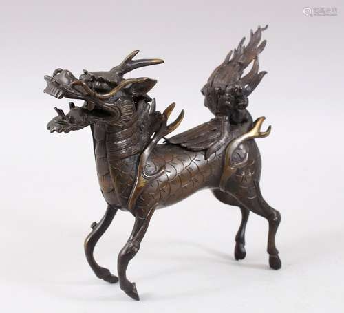 A GOOD CHINESE MING DYNASTY BRONZE QILIN INSENCE BURNER, stood in a striding pose with its mouth