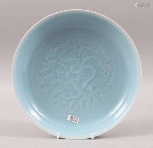 A GOOD QUALITY CHINESE CARVED CLAIRE DE LUNE GLAZED PORCELAIN DRAGON DISH, the interior with