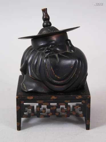 A JAPANESE MEIJI / TAISHO PERIOD BRONZE BUDDHA / HOTEI ON STAND, depicting a cast hollow bronze