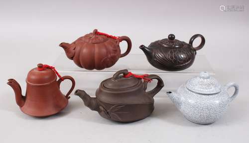 A MIXED LOT OF FIVE 19TH / 20TH CENTURY CHINESE YIXING CLAY TEA POTS, consisting of five clay Yixing