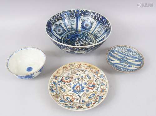 A COLLECTION OF FOUR 16TH-17TH CENTURY PERSIAN POTTERY PIECES, two bowls and two plates.