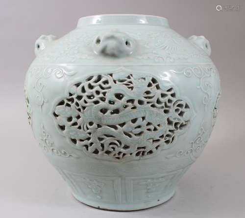 A LARGE CHINESE CELADONO GROUND PIERCED MING STYLE PORCELAIN VASE, the moulded lappet border beneath