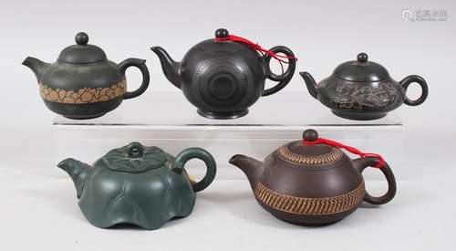 A MIXED LOT OF FIVE 19TH / 20TH CENTURY CHINESE YIXING CLAY TEA POTS, consisting of five clay Yixing