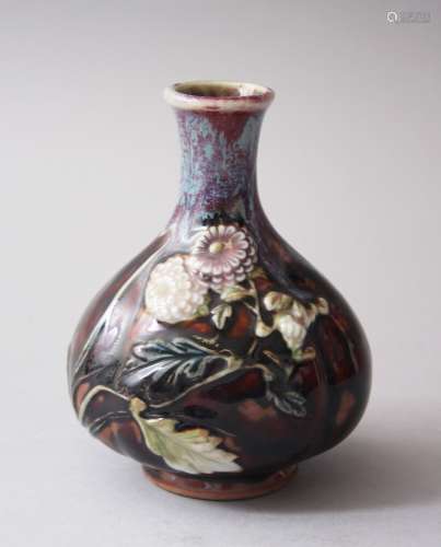 A 19TH / 20TH CENTURY CHINESE MOULDED FLAMBE PORCELAIN VASE, with moulded decoration of floral