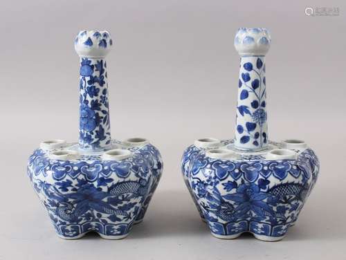 A PAIR OF 19TH CENTURY CHINESE BLUE & WHITE PORCELAIN TULIP HEAD BOTTLE VASES, both decorated with