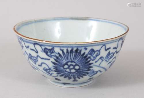 A CHINESE BLUE & WHITE MING DYNASTY PORCELAIN BOWL, the exterior decorated with formal floral