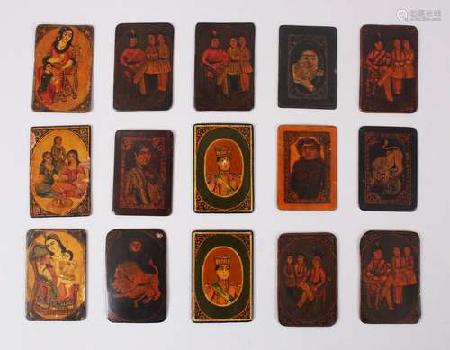 A COLLECTION OF FIFTEEN 19TH CENTURY PERSIAN QAJAR LACQUER PAPIER MACHE PLAYING CARDS