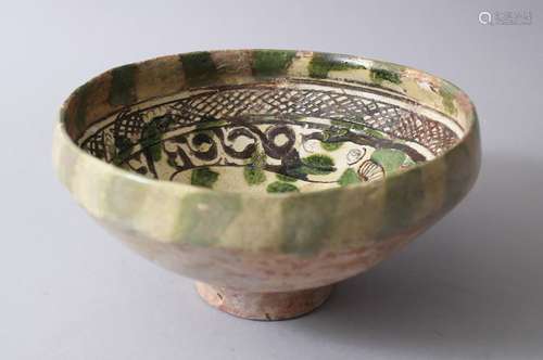 A 12TH-13TH CENTURY GARUS GLAZED POTTERY BOWL bearing a rams image amongst foliage.